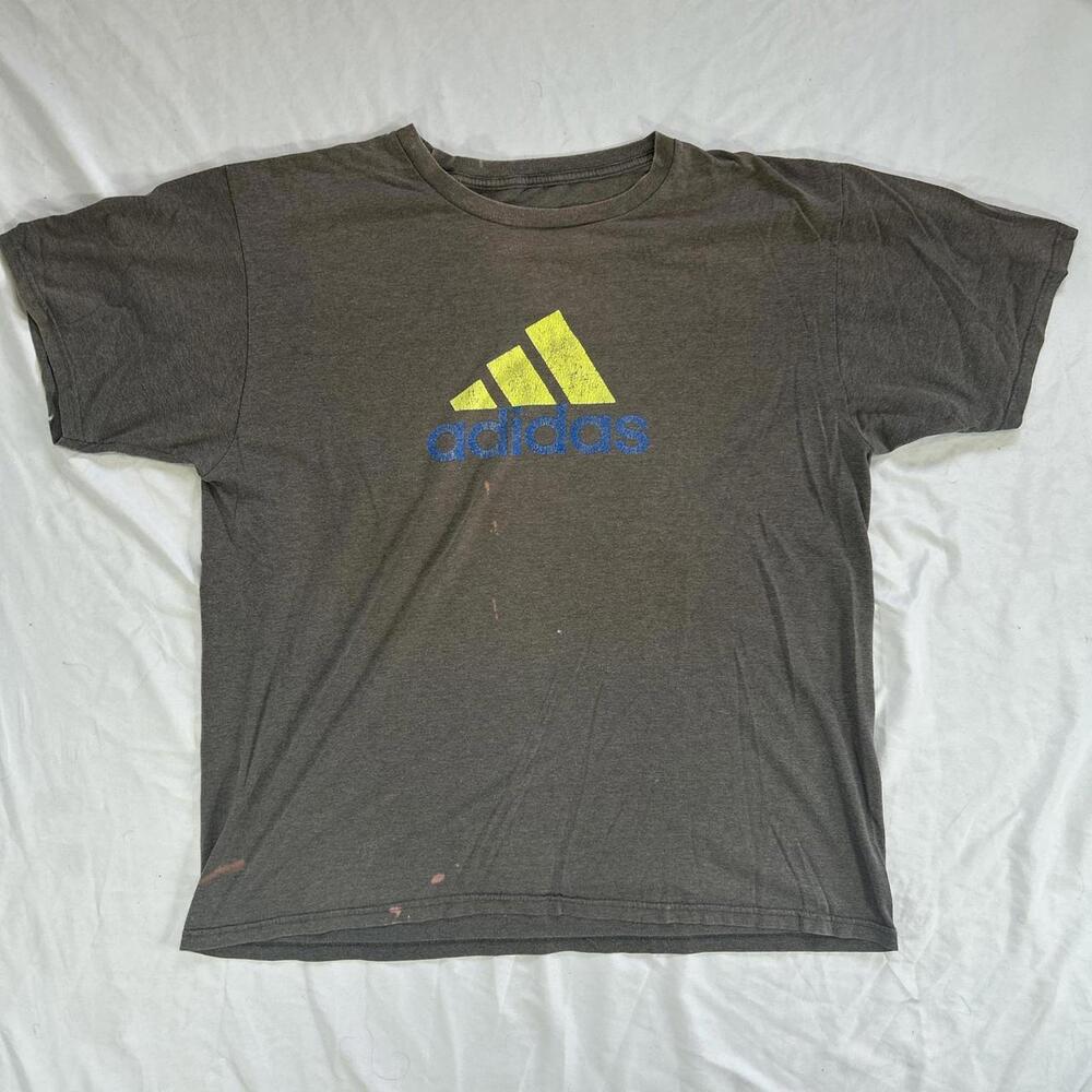 Adidas “The Go-To Tee” Graphic T-Shirt in heather charcoal gray.